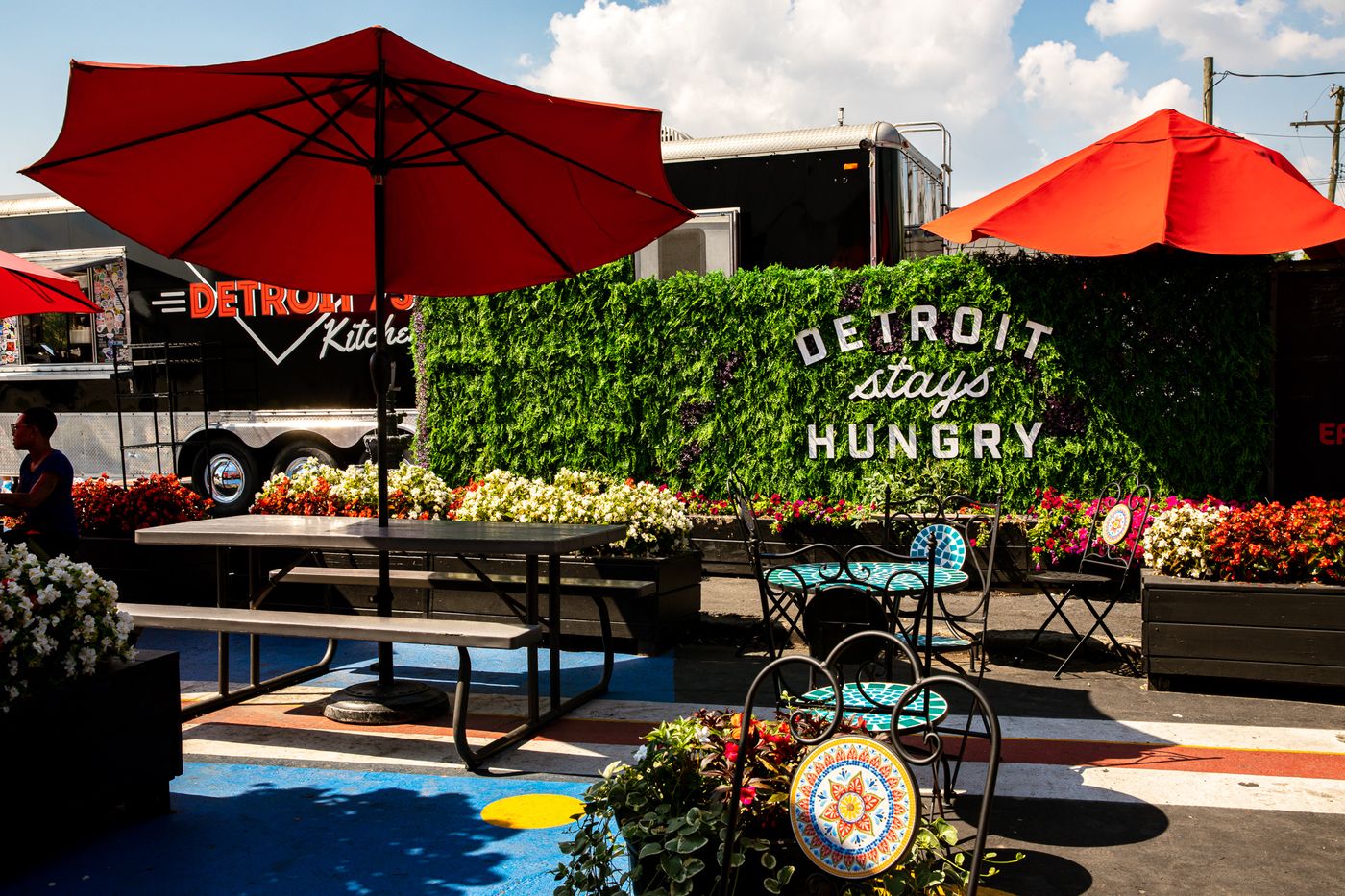 The Detroit Stays Hungry wall on the patio at Detroit 75 Kitchen on Fort Street